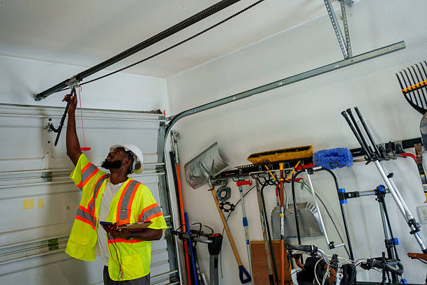 Professional Garage Door Panel Replacement technician working in Steele Creek, AK